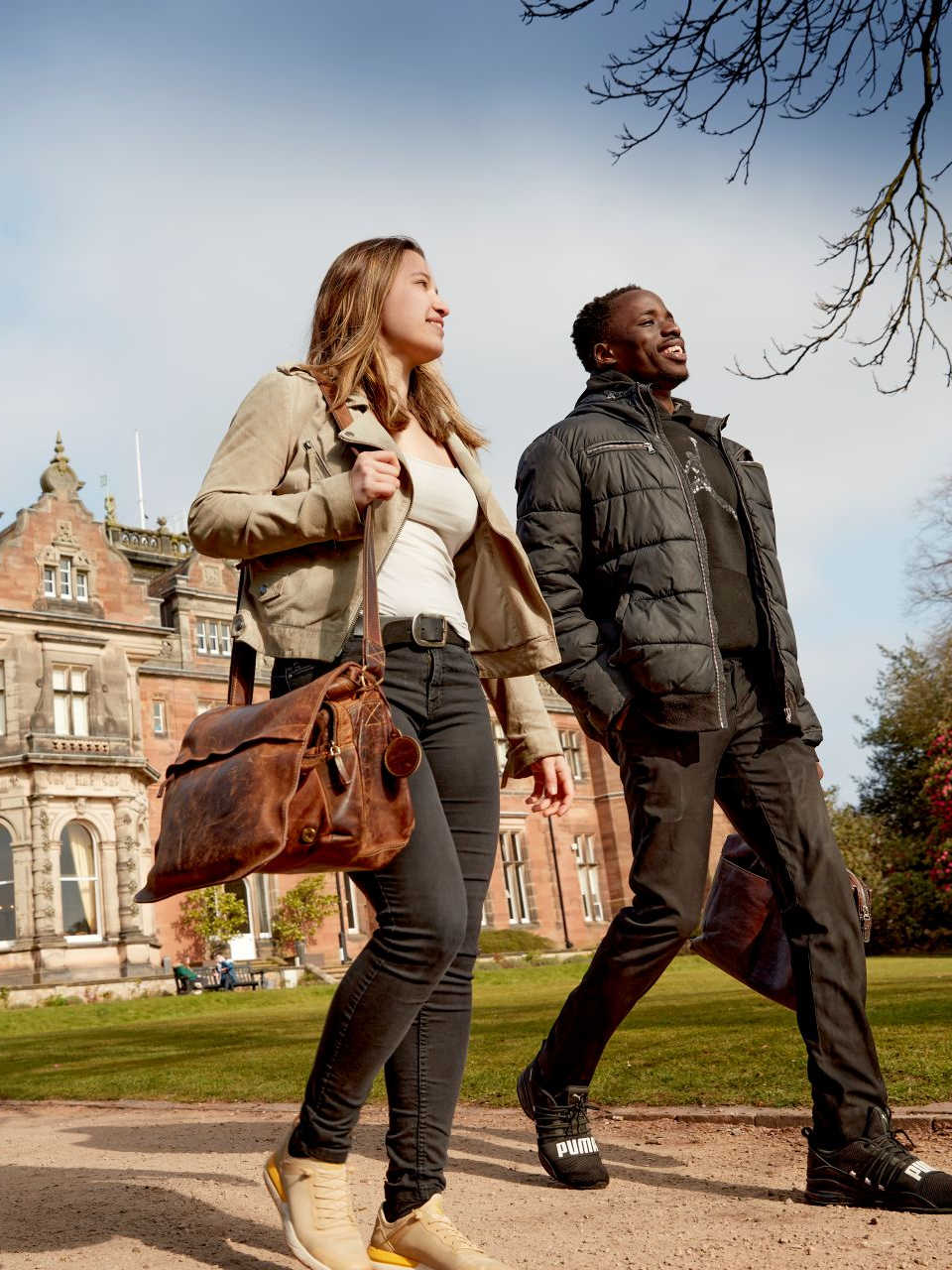 Two students walking on campus